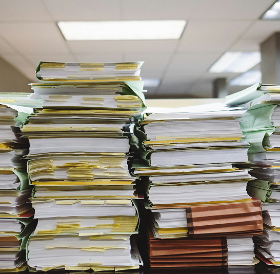 Professionals reviewing business documents with AI-powered data extraction overlays